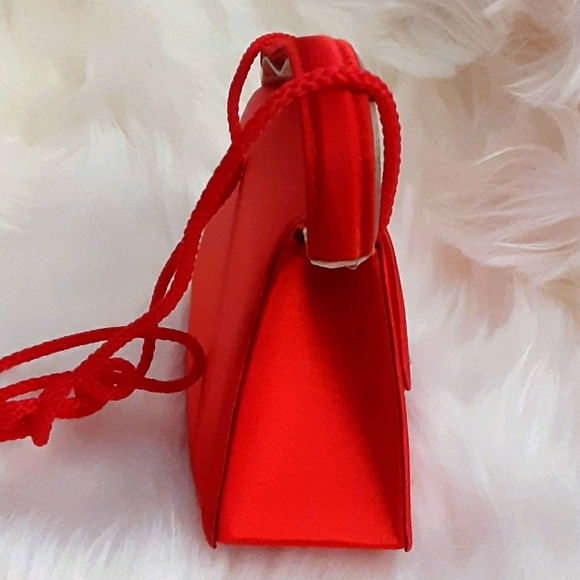 Handbags - A red Evening bag.